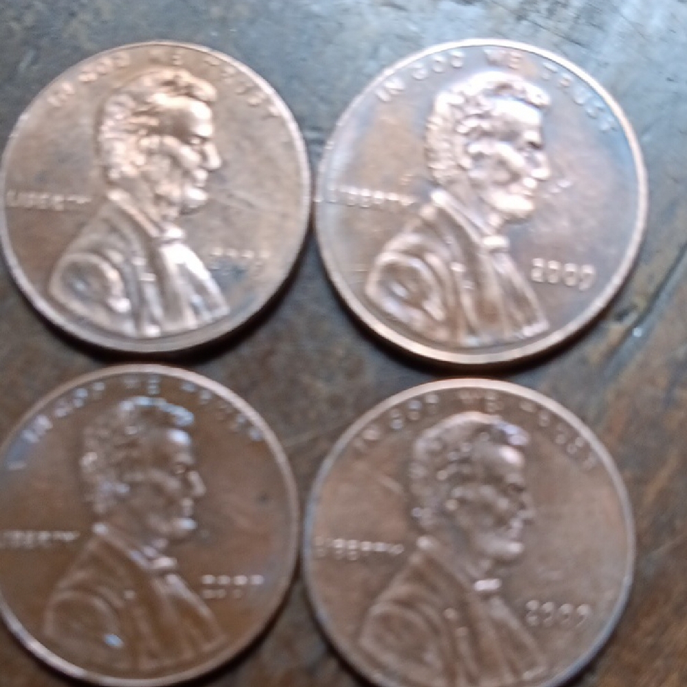 Set of Four Copper Coins